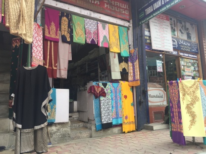 Colourful embroidered shawls and pherans